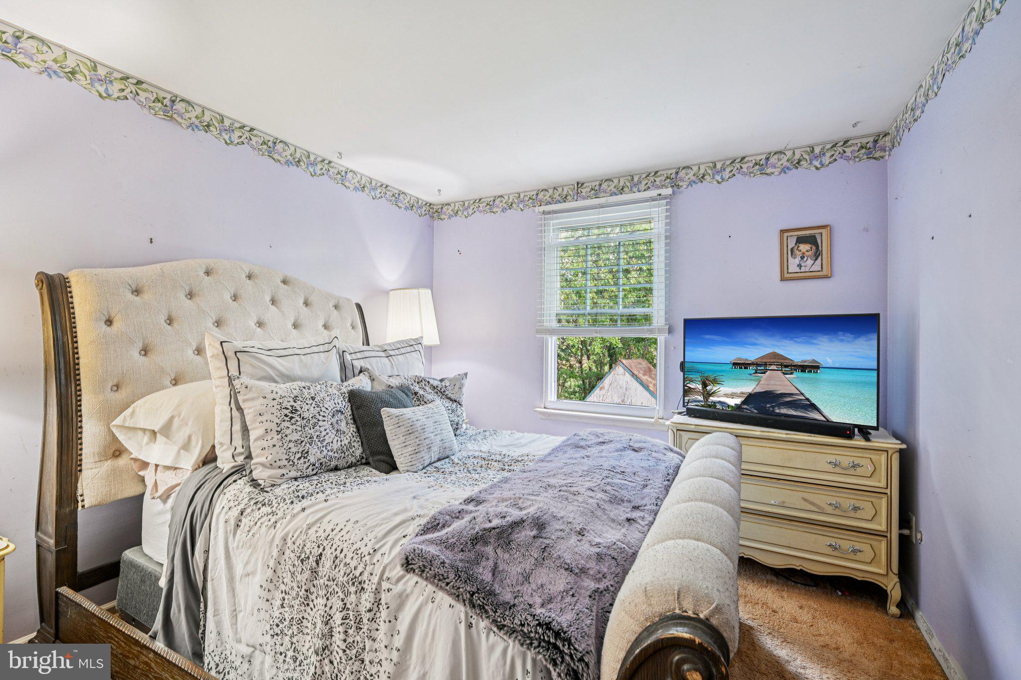 13 Tarnsfield Road Westampton, NJ 08060 - Photo 29 of 44 a bedroom with a bed and a flat tv screen on dresser