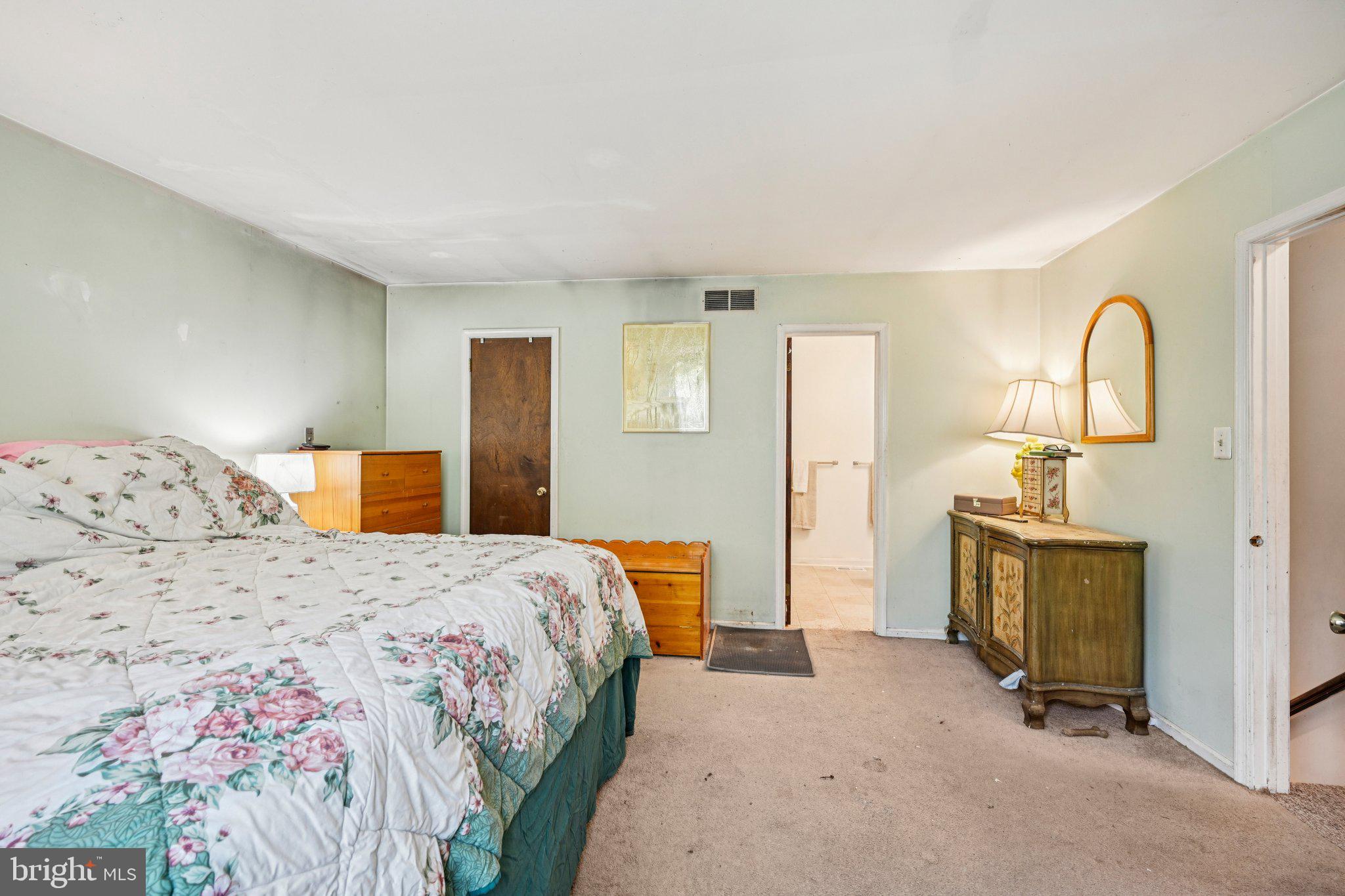 13 Tarnsfield Road Westampton, NJ 08060 - Photo 31 of 44 a bedroom with a bed and wooden floor