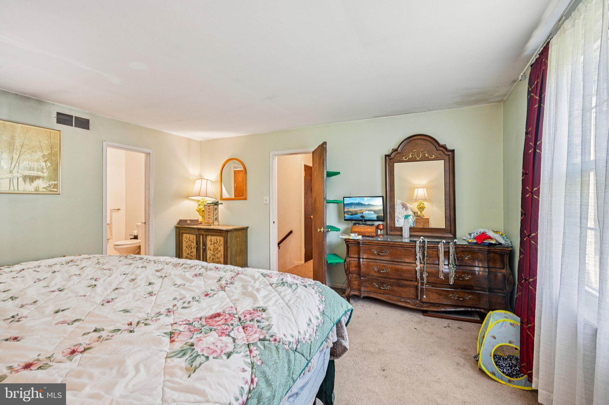 13 Tarnsfield Road Westampton, NJ 08060 - Photo 32 of 44 a bedroom with a bed and dresser with mirror