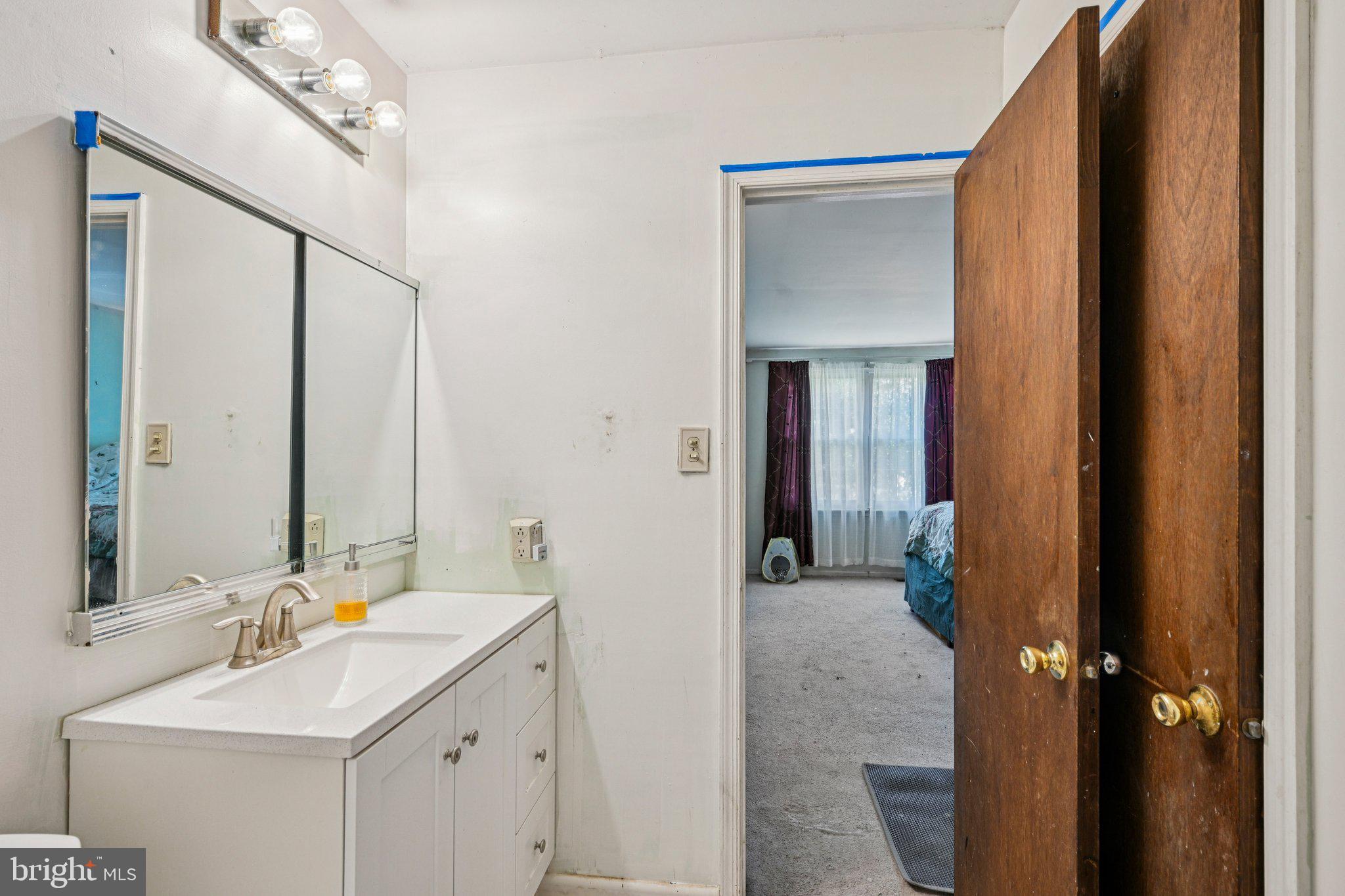 13 Tarnsfield Road Westampton, NJ 08060 - Photo 35 of 44 a bathroom with a sink and a mirror