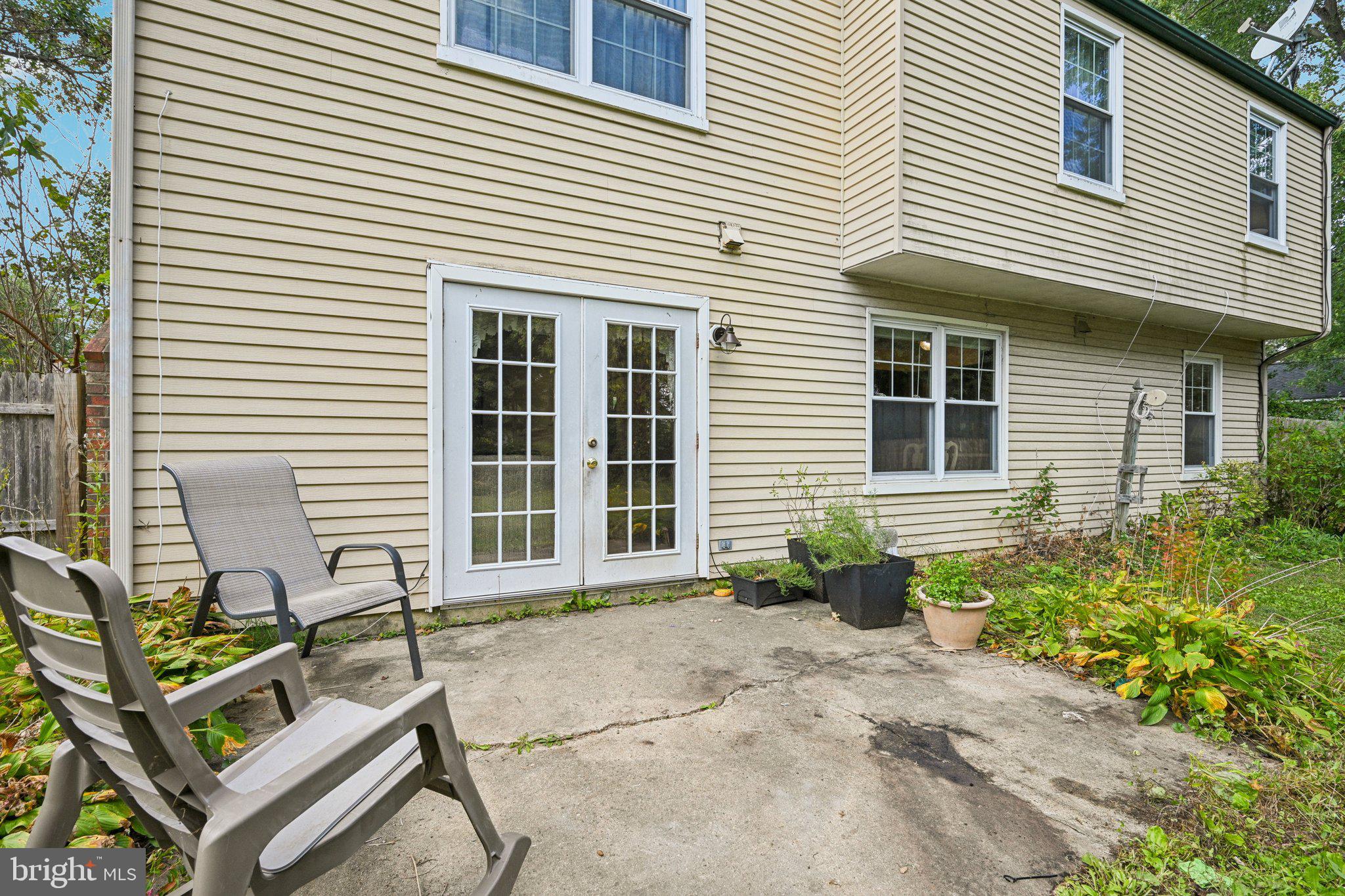 13 Tarnsfield Road Westampton, NJ 08060 - Photo 36 of 44 a front view of a house with porch and seating space