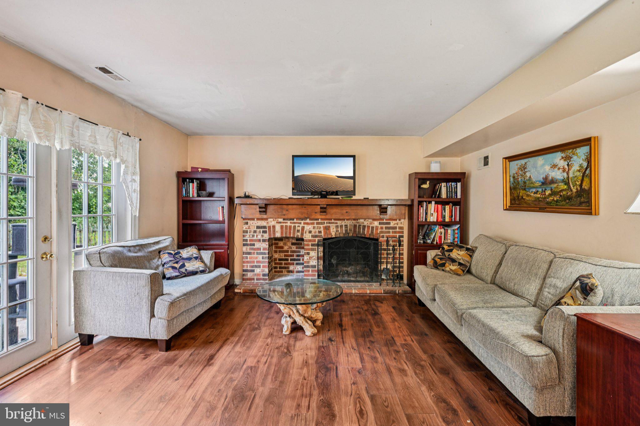 13 Tarnsfield Road Westampton, NJ 08060 - Photo 7 of 44 a living room with furniture and a fireplace