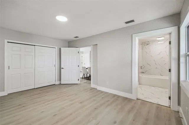 an empty room with windows