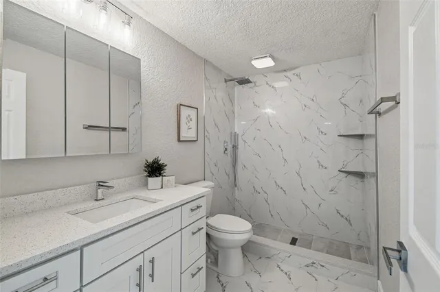 an aerial view of a house with a garden