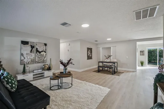 a living room with furniture and a couch