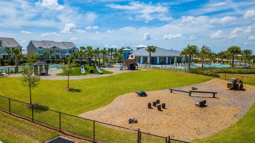 3508 Anchor Bay Trail Lakewood Ranch, FL 34211 - Photo 51 of 74 a view of a swimming pool and lounge chairs