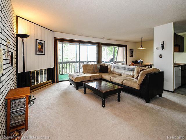 1734 Grove Road, Unit 204B Ypsilanti, MI 48198 - Photo 4 of 24 MLS4_main_livingroom.jpg
