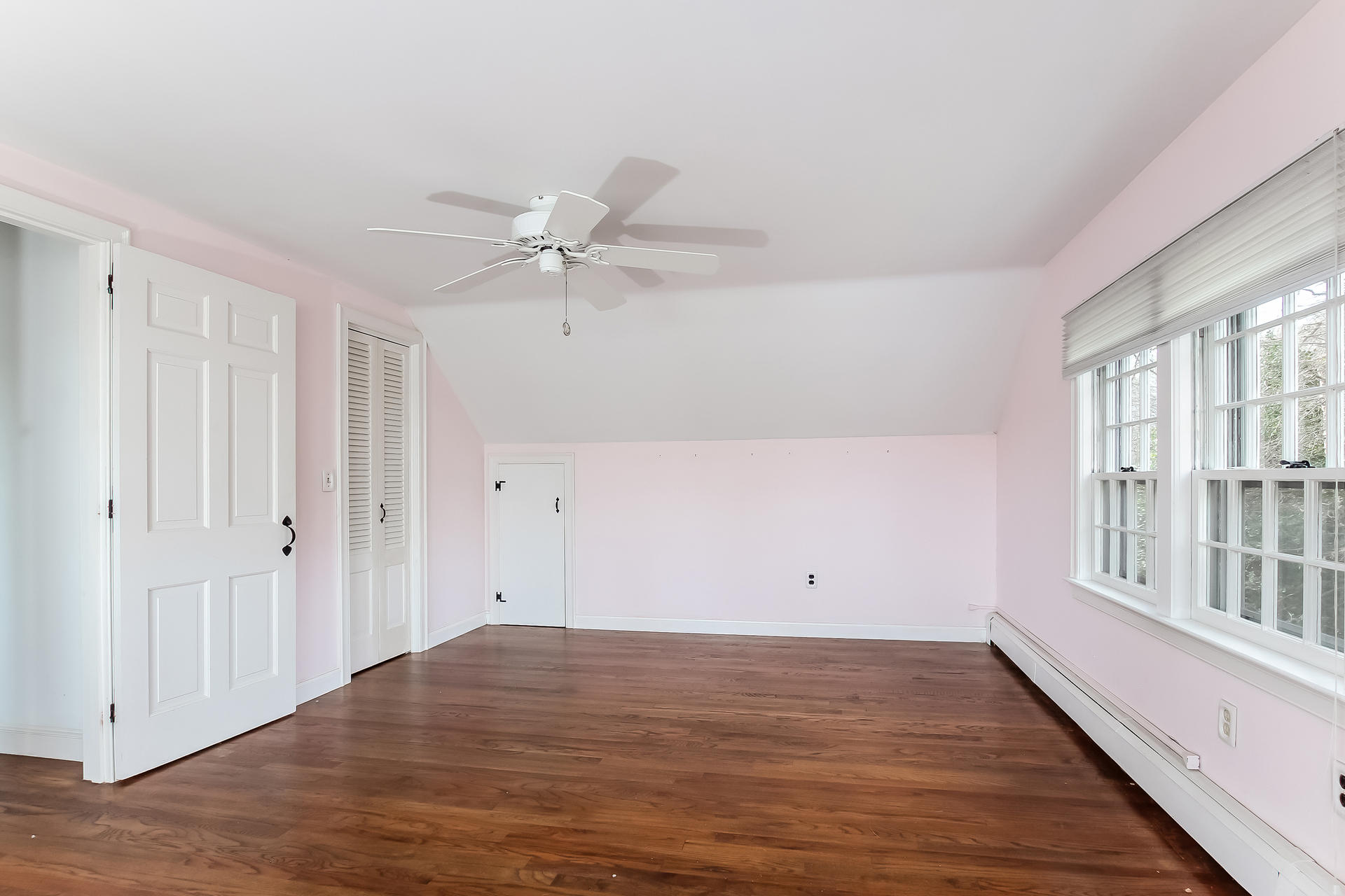 212 Holly Point Road Centerville, MA 02632 - Photo 22 of 30 wooden floor in an empty room with a window