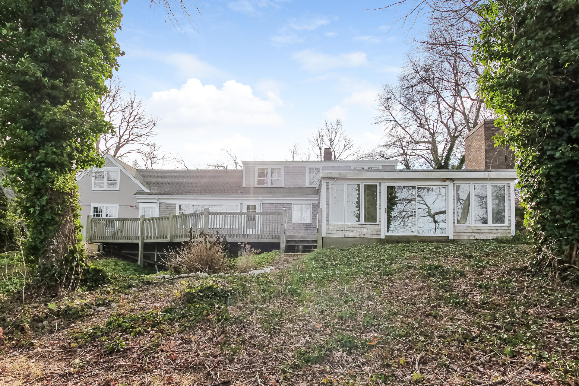 212 Holly Point Road Centerville, MA 02632 - Photo 5 of 30 a house view with a outdoor space