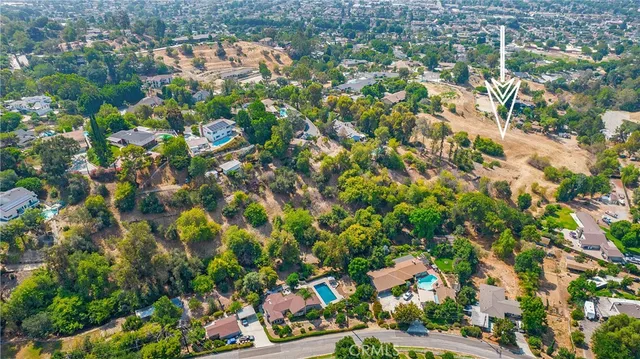 a view of a plant with a yard