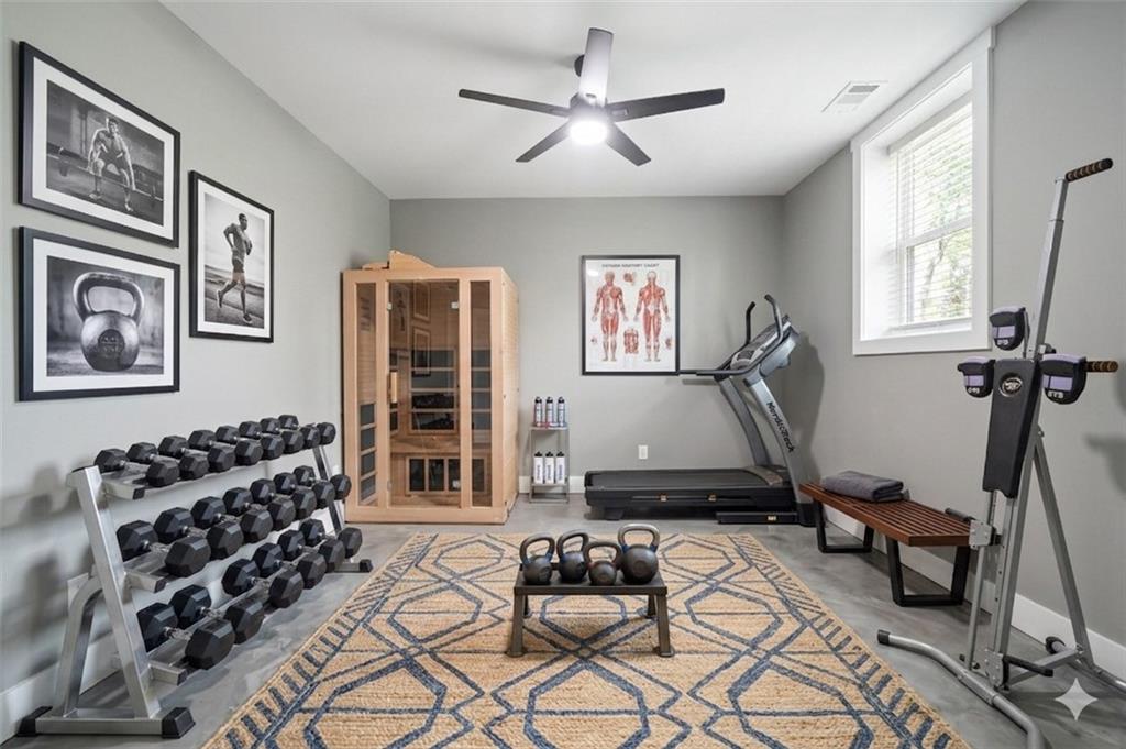 2021 Lakeview Parkway Villa Rica, GA 30180 - Photo 56 of 112 a living room with furniture gym equipment and a window