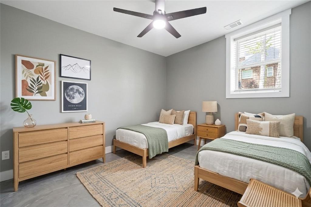 2021 Lakeview Parkway Villa Rica, GA 30180 - Photo 57 of 112 a bedroom with two beds and painting on the wall