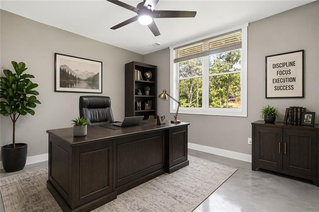 2021 Lakeview Parkway Villa Rica, GA 30180 - Photo 62 of 112 a view of a workspace with furniture and window
