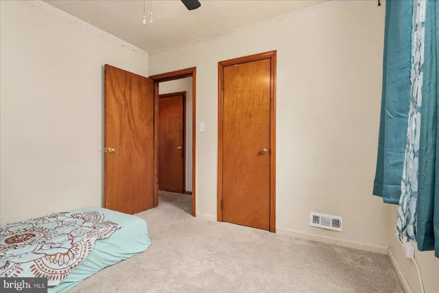 a view of livingroom with closet