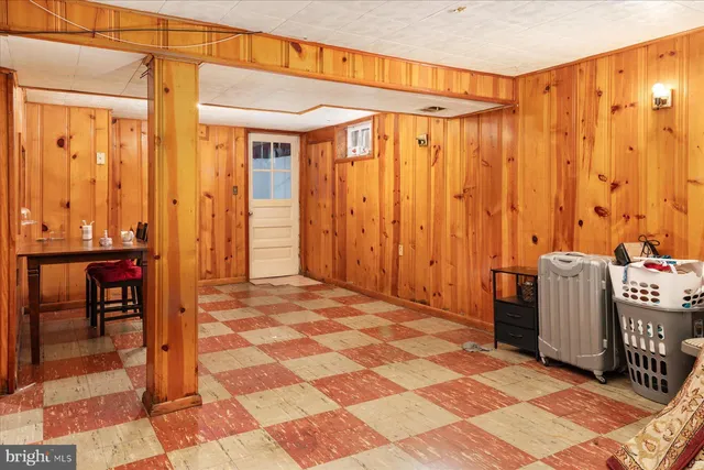 a bedroom with a bed and a table in it