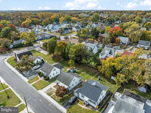 an aerial view of house with yard
