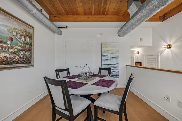 a view of a dining room with furniture