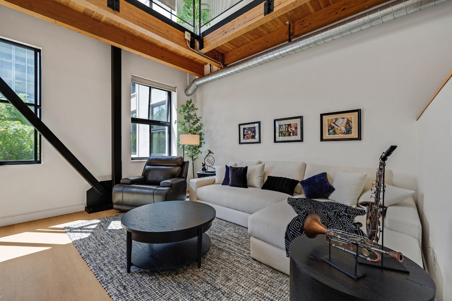 333 Santana Row, Unit 224 San Jose, CA 95128 - Photo 14 of 30 a living room with furniture and a window