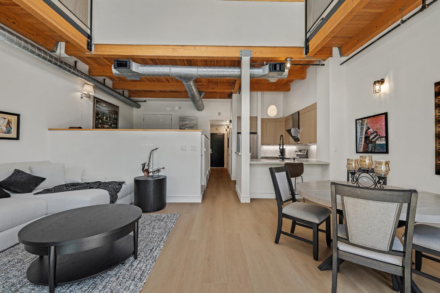 333 Santana Row, Unit 224 San Jose, CA 95128 - Photo 15 of 30 a living room with furniture