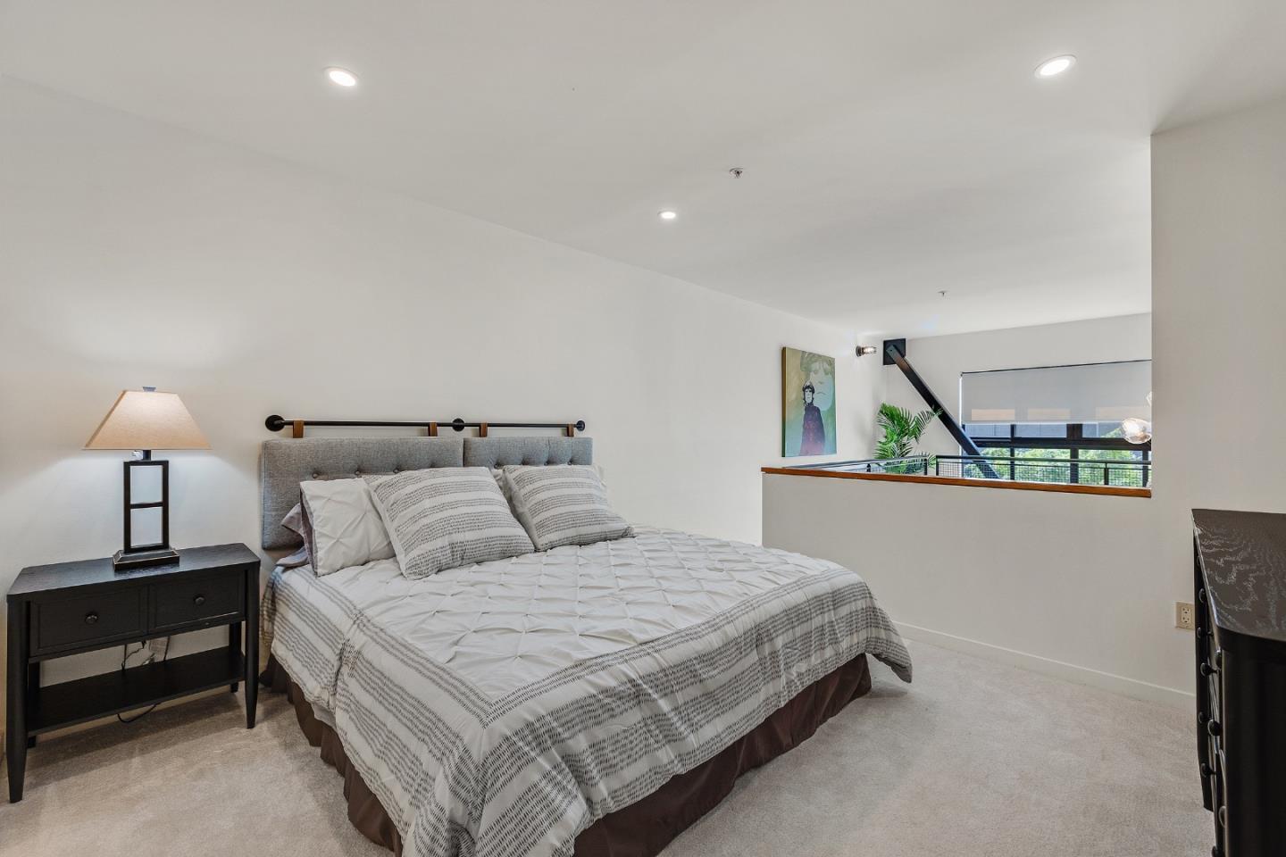 333 Santana Row, Unit 224 San Jose, CA 95128 - Photo 18 of 30 a bedroom with a bed and a window