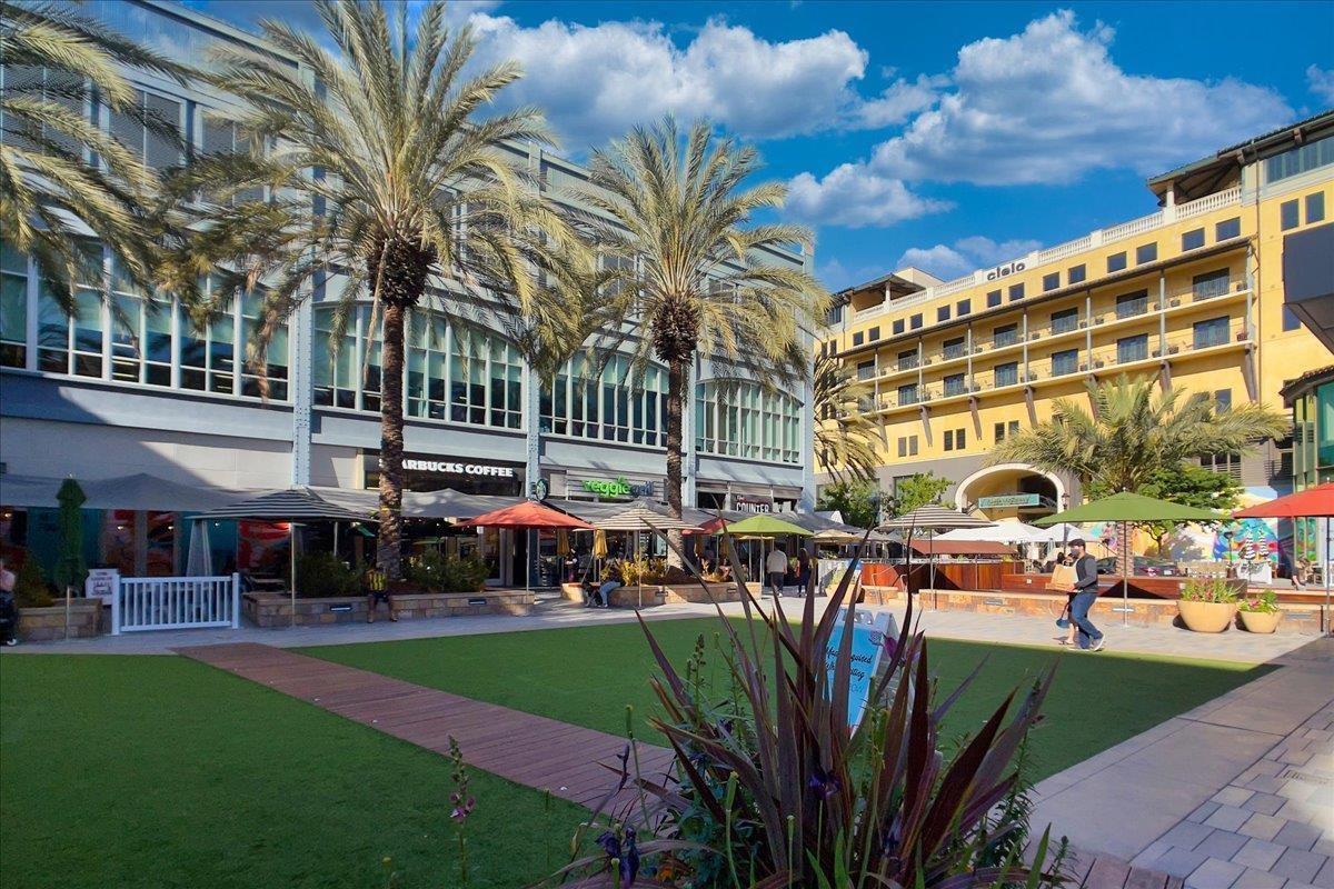 333 Santana Row, Unit 224 San Jose, CA 95128 - Photo 29 of 30 a front view of building with outdoor seating and city view