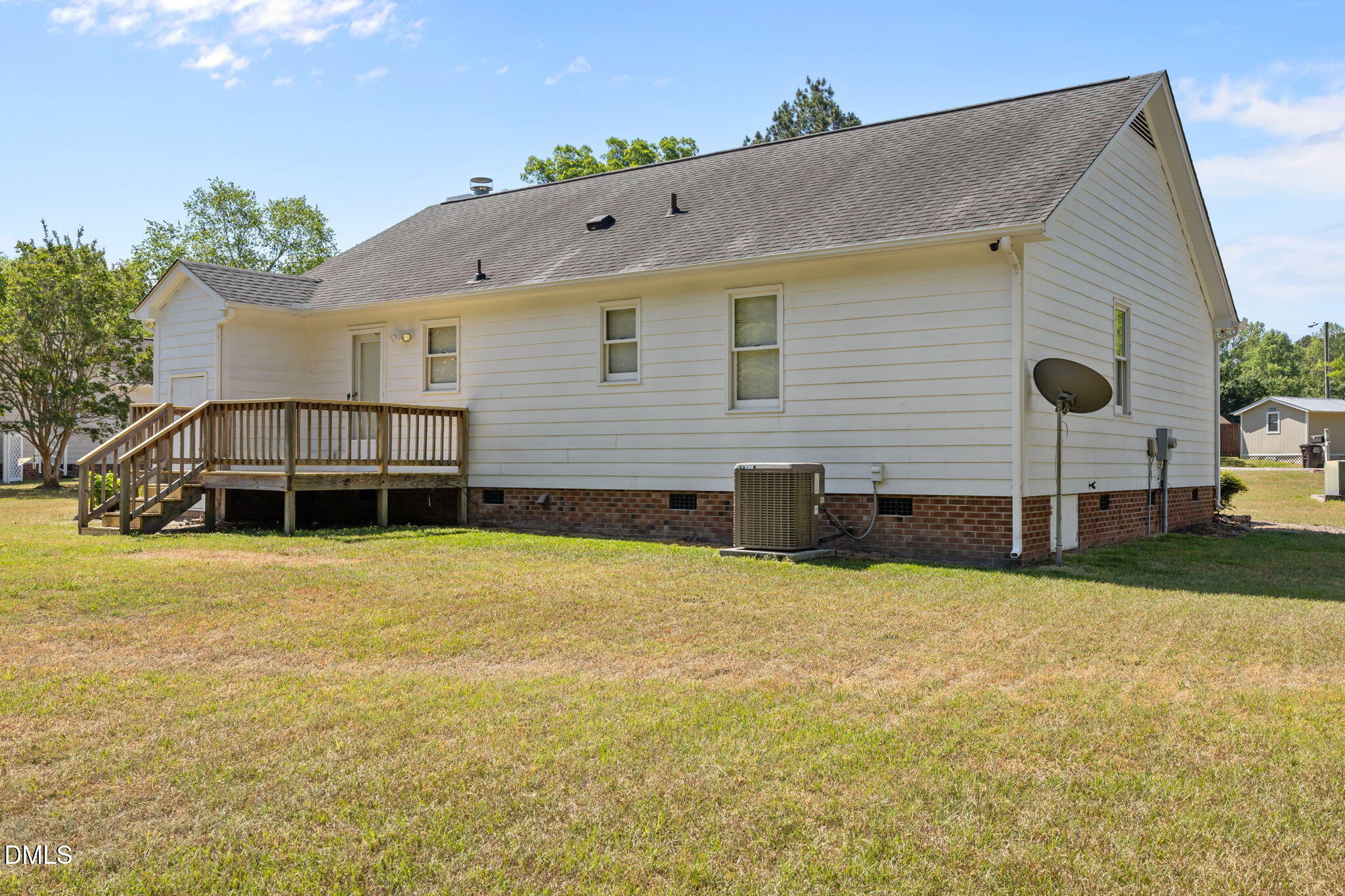 40 Circle Tree Lane Angier, NC 27501 - Photo 34 of 39 a view of a house with backyard and trees