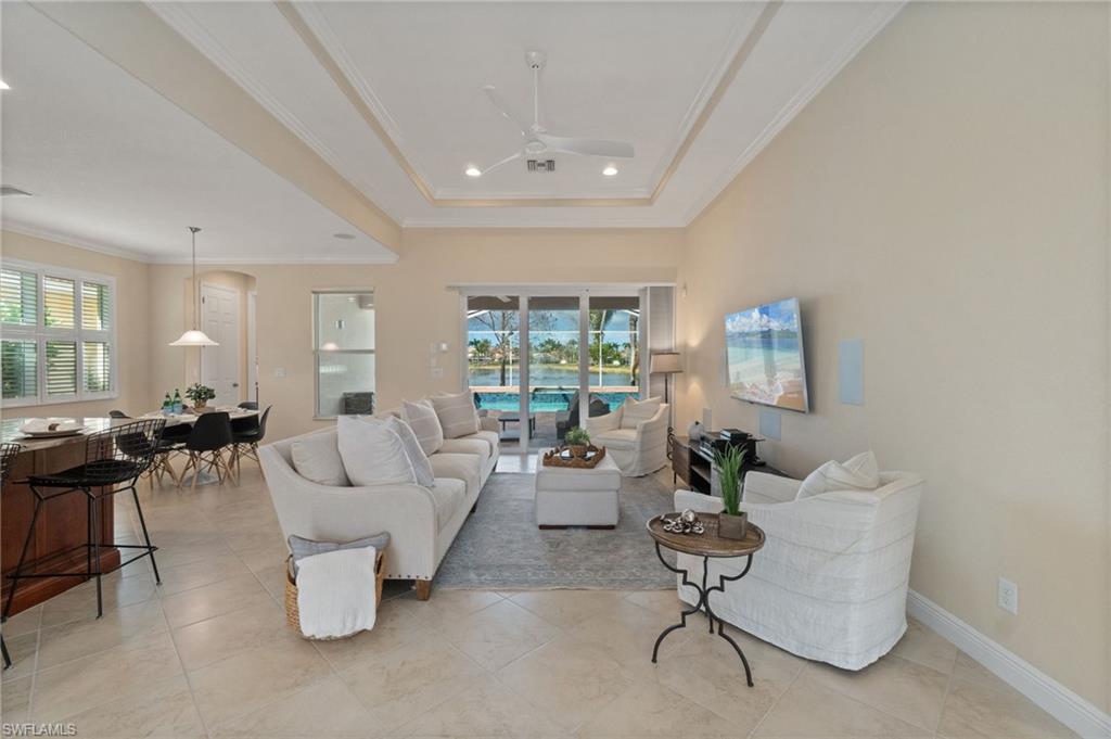 19753 Tesoro Way Estero, FL 33967 - Photo 6 of 47 a living room with furniture and a large window