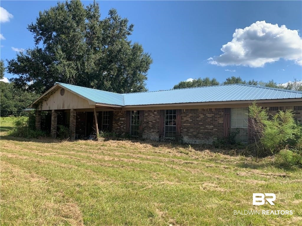 12751 Creel Road Grand Bay, AL 36541 - Photo 1 of 2 View of front of home with a front yard