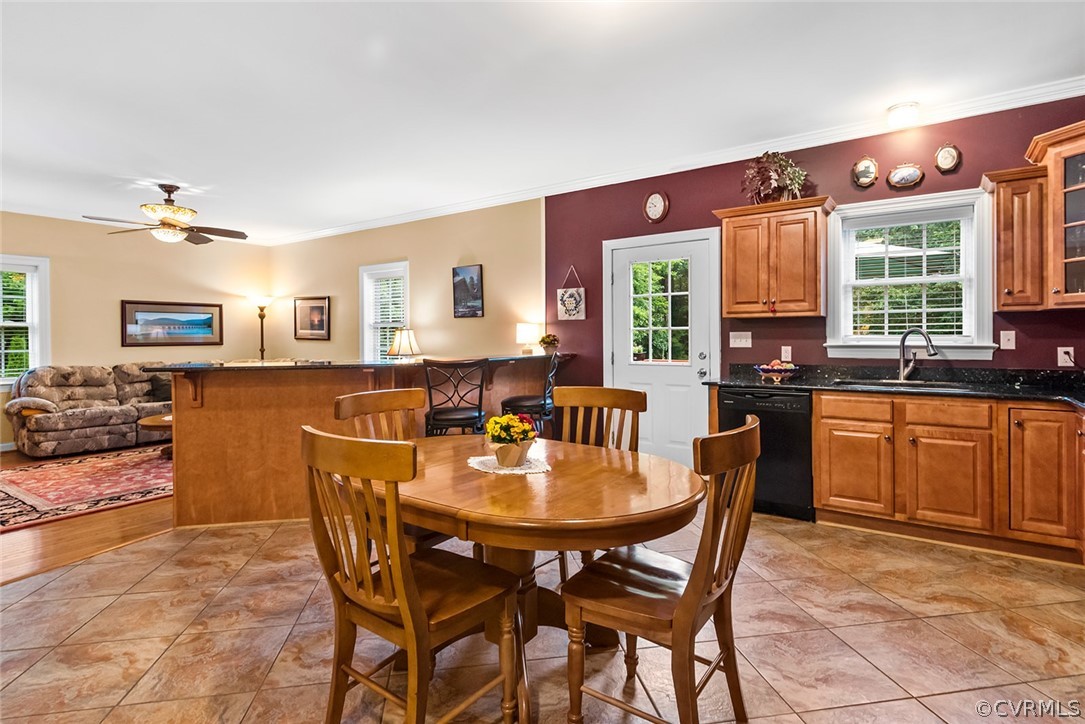 739 Glebe Landing Road Center Cross, VA 22437 - Photo 11 of 46 The eat-in kitchen and den combination provide a g