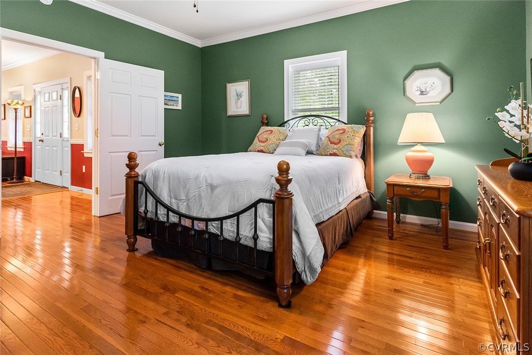 739 Glebe Landing Road Center Cross, VA 22437 - Photo 23 of 46 This first floor primary bedroom is immediately fo