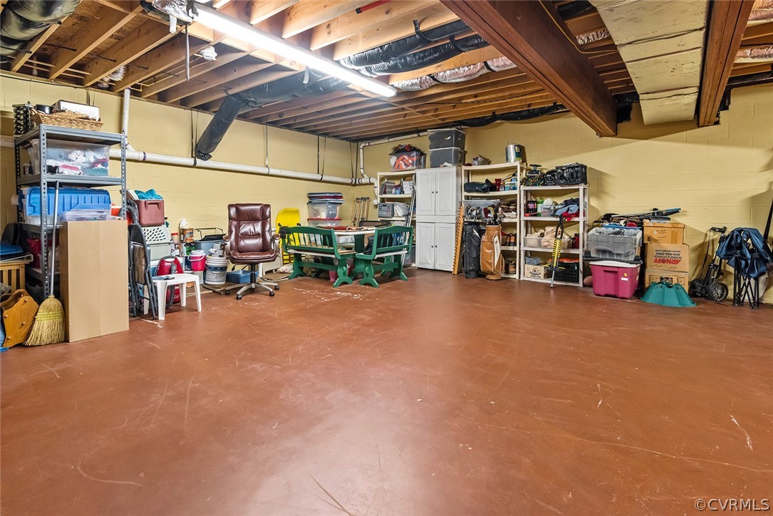 739 Glebe Landing Road Center Cross, VA 22437 - Photo 35 of 46 The large conditioned basement has lots of work an