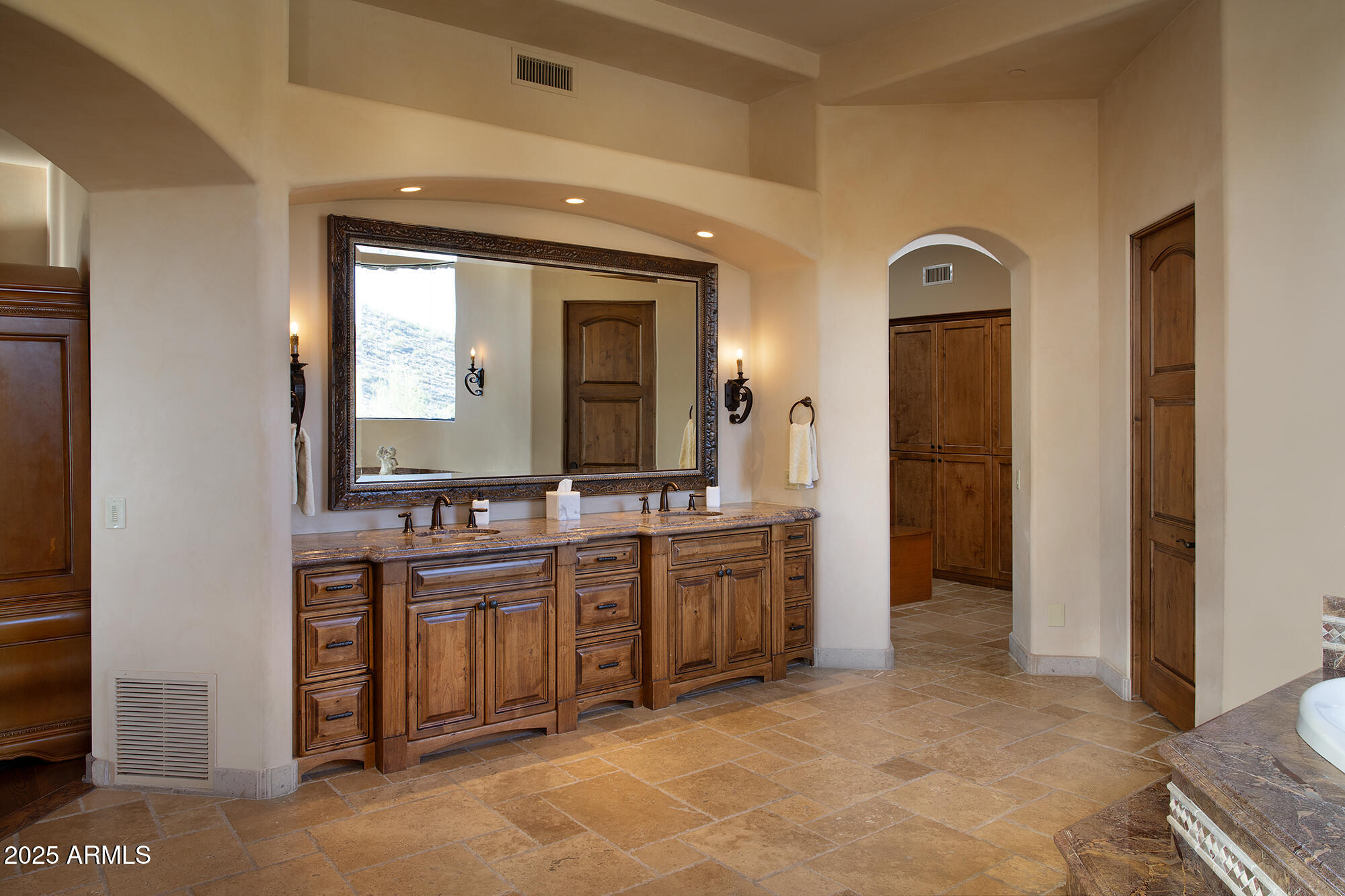 10801 East Happy Valley Road, Unit 119 Scottsdale, AZ 85255 - Photo 21 of 51 a view of a bathroom with dual sinks