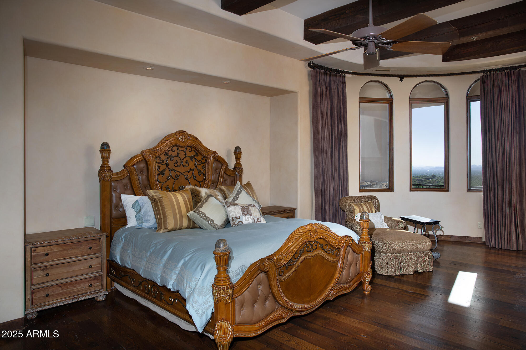 10801 East Happy Valley Road, Unit 119 Scottsdale, AZ 85255 - Photo 21 of 52 a bedroom with a bed and wooden floor