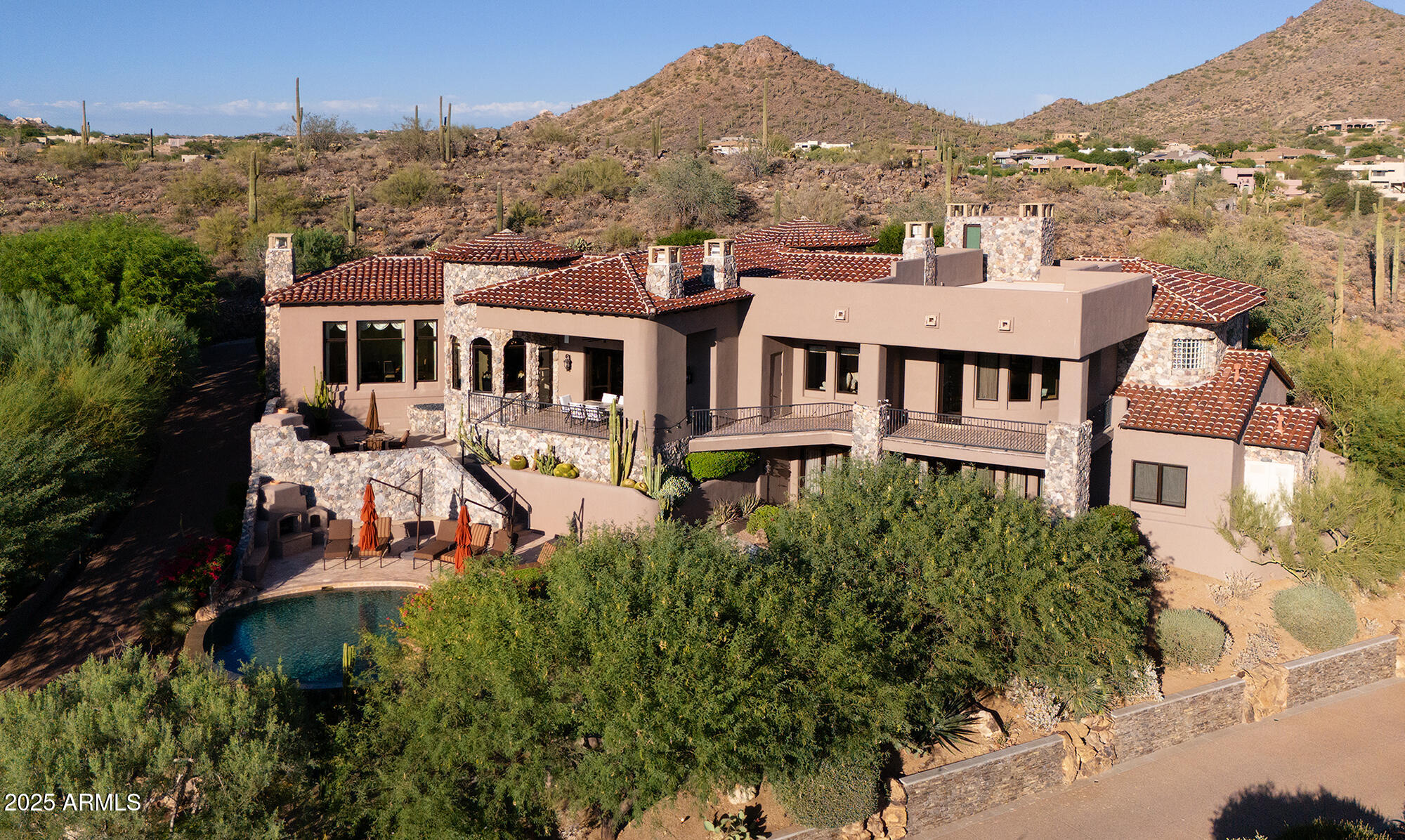 10801 East Happy Valley Road, Unit 119 Scottsdale, AZ 85255 - Photo 25 of 52 an aerial view of a house with a yard lake and mountain view