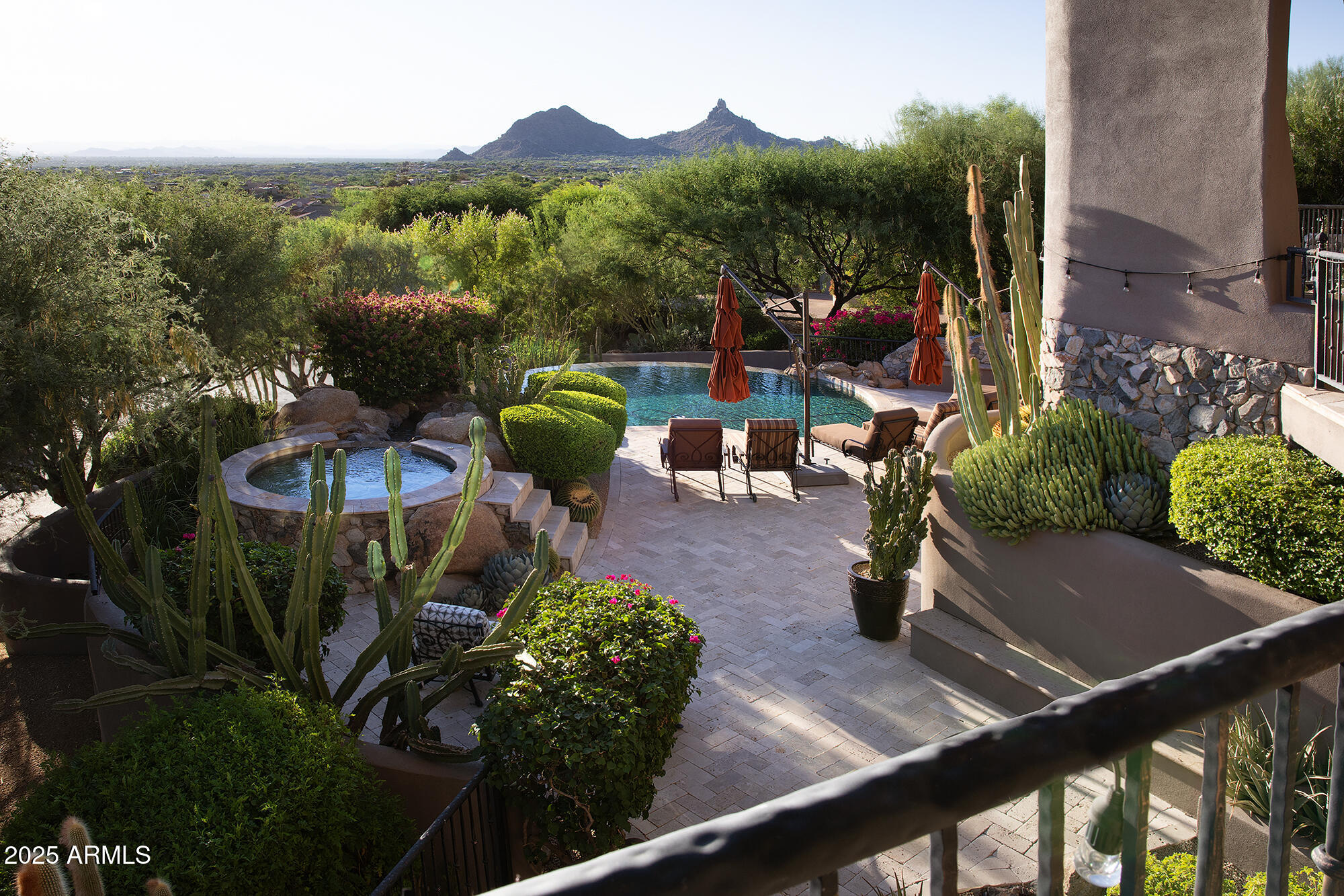 10801 East Happy Valley Road, Unit 119 Scottsdale, AZ 85255 - Photo 29 of 52 a view of a chairs and table in patio