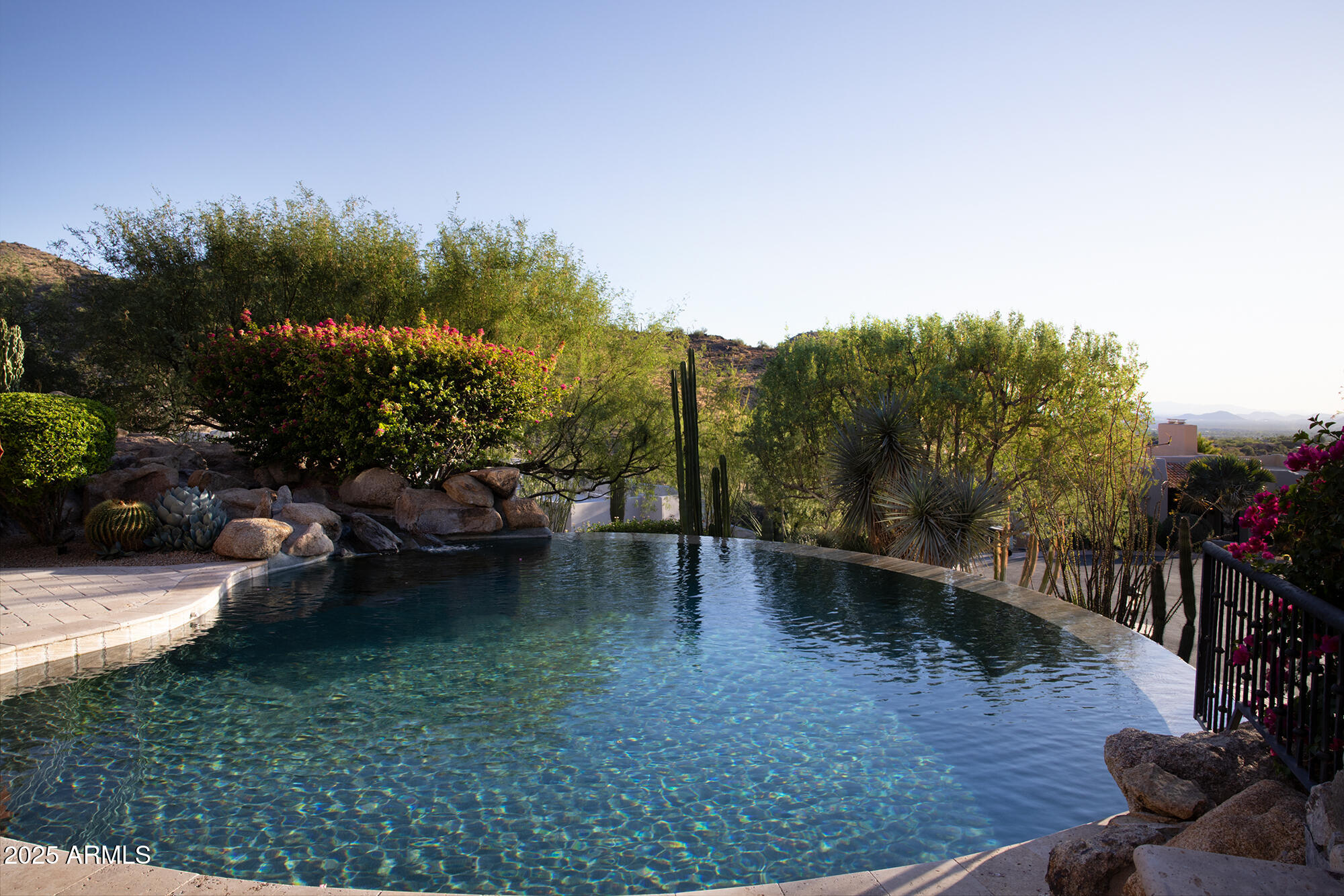 10801 East Happy Valley Road, Unit 119 Scottsdale, AZ 85255 - Photo 32 of 52 a view of a backyard with sitting area