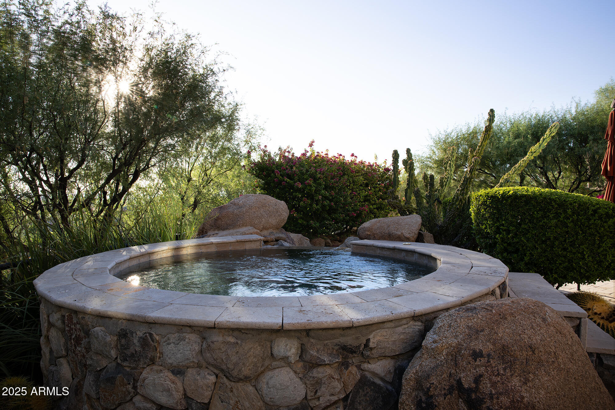 10801 East Happy Valley Road, Unit 119 Scottsdale, AZ 85255 - Photo 34 of 52 a view of a fountain in the backyard of house