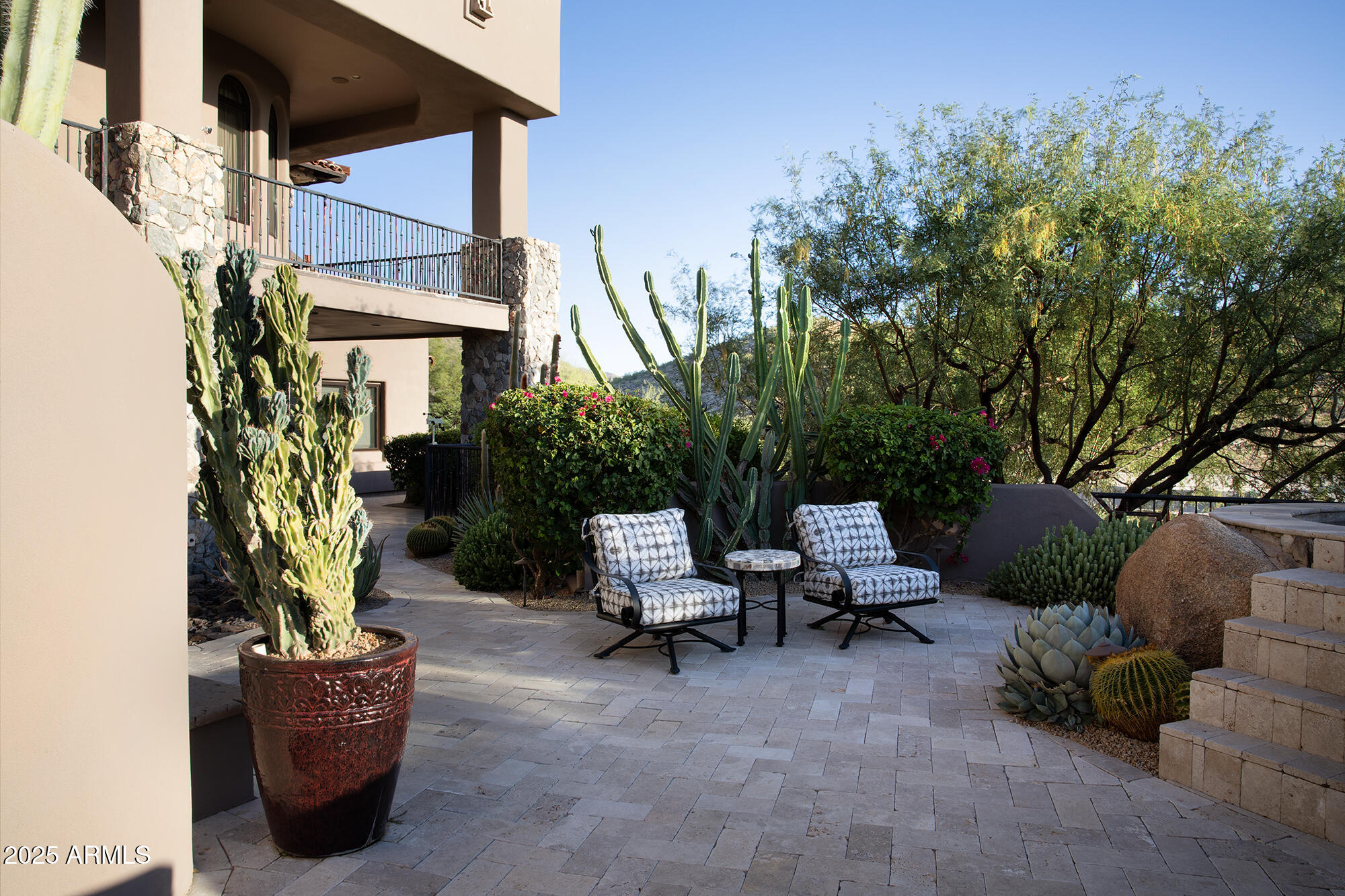 10801 East Happy Valley Road, Unit 119 Scottsdale, AZ 85255 - Photo 37 of 52 a view of a patio with couches and potted plants