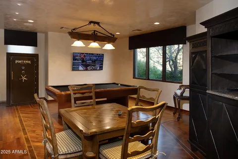 a work room with furniture and a window