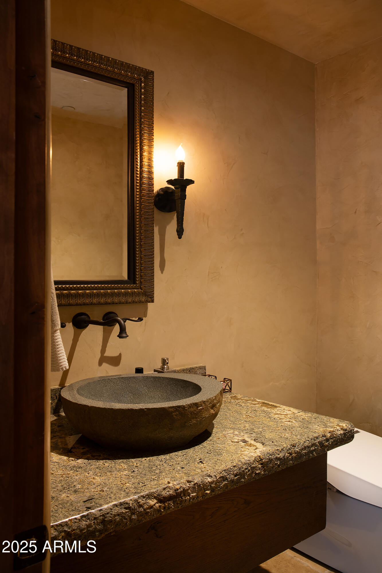 10801 East Happy Valley Road, Unit 119 Scottsdale, AZ 85255 - Photo 41 of 52 a bathroom with a granite countertop sink and a mirror