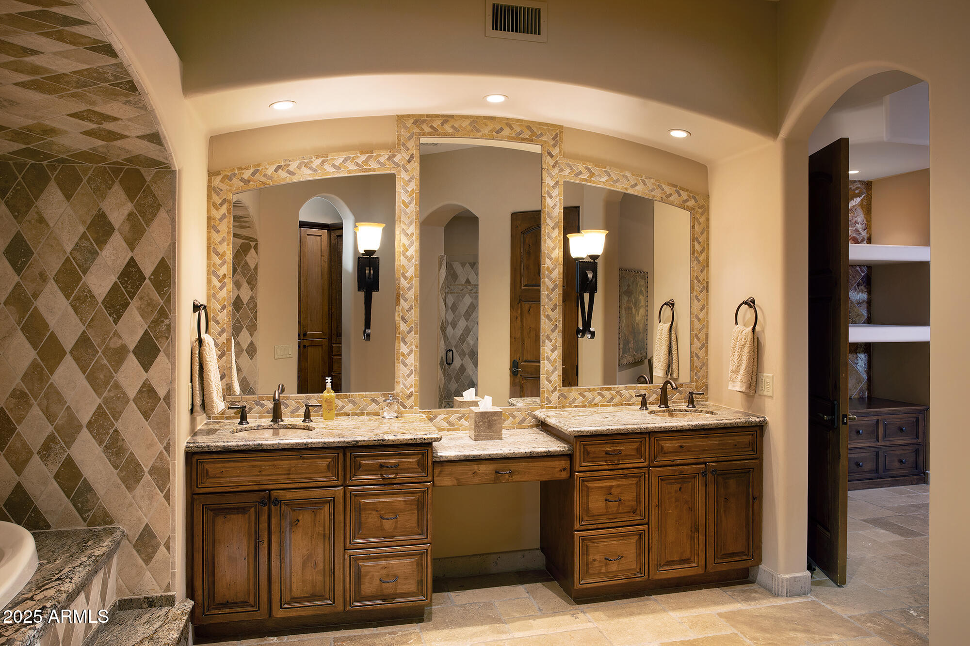 10801 East Happy Valley Road, Unit 119 Scottsdale, AZ 85255 - Photo 43 of 52 a bathroom with a double vanity sink and a mirror