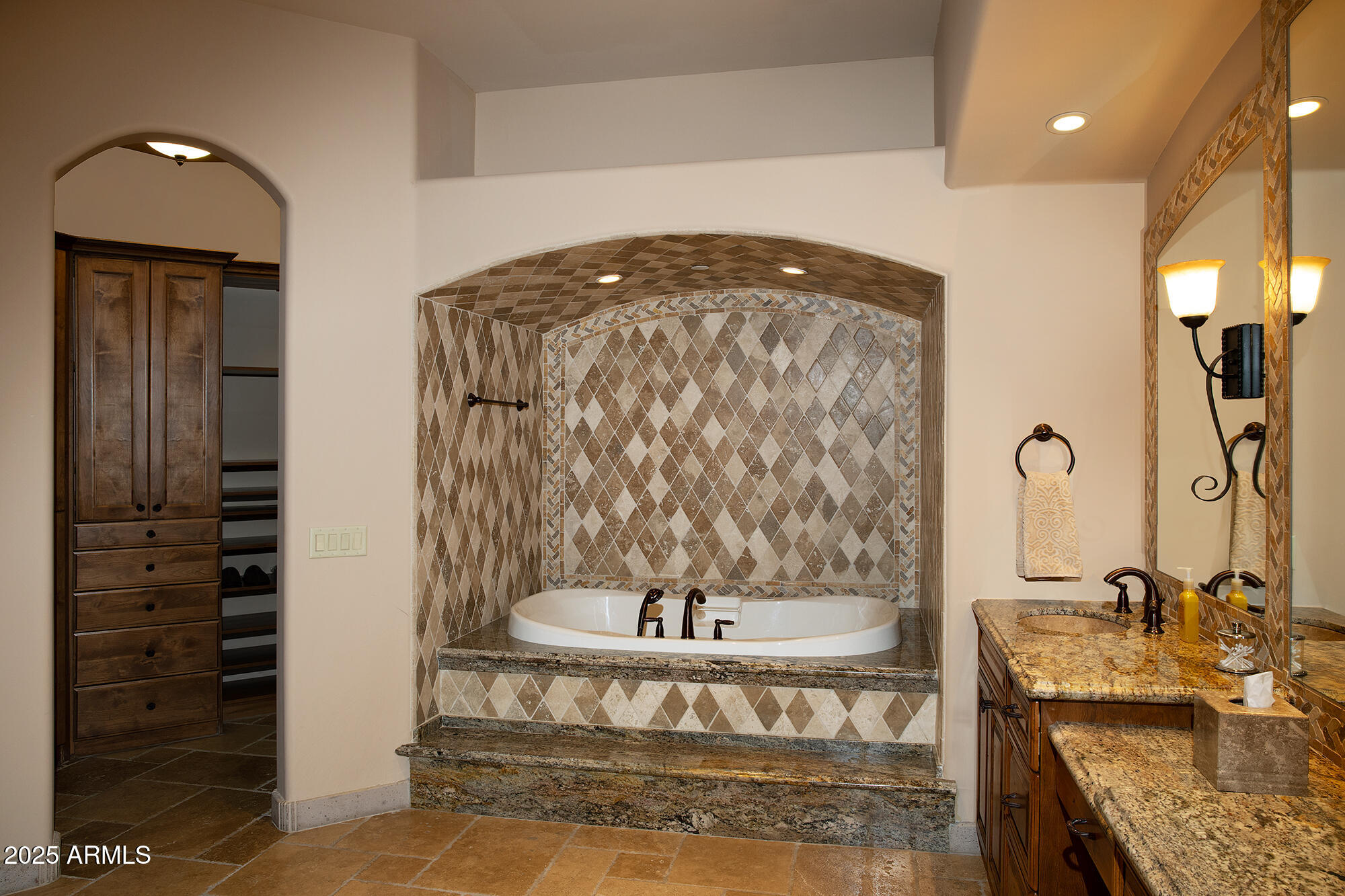 10801 East Happy Valley Road, Unit 119 Scottsdale, AZ 85255 - Photo 44 of 52 a bathroom with a granite countertop sink a mirror and shower