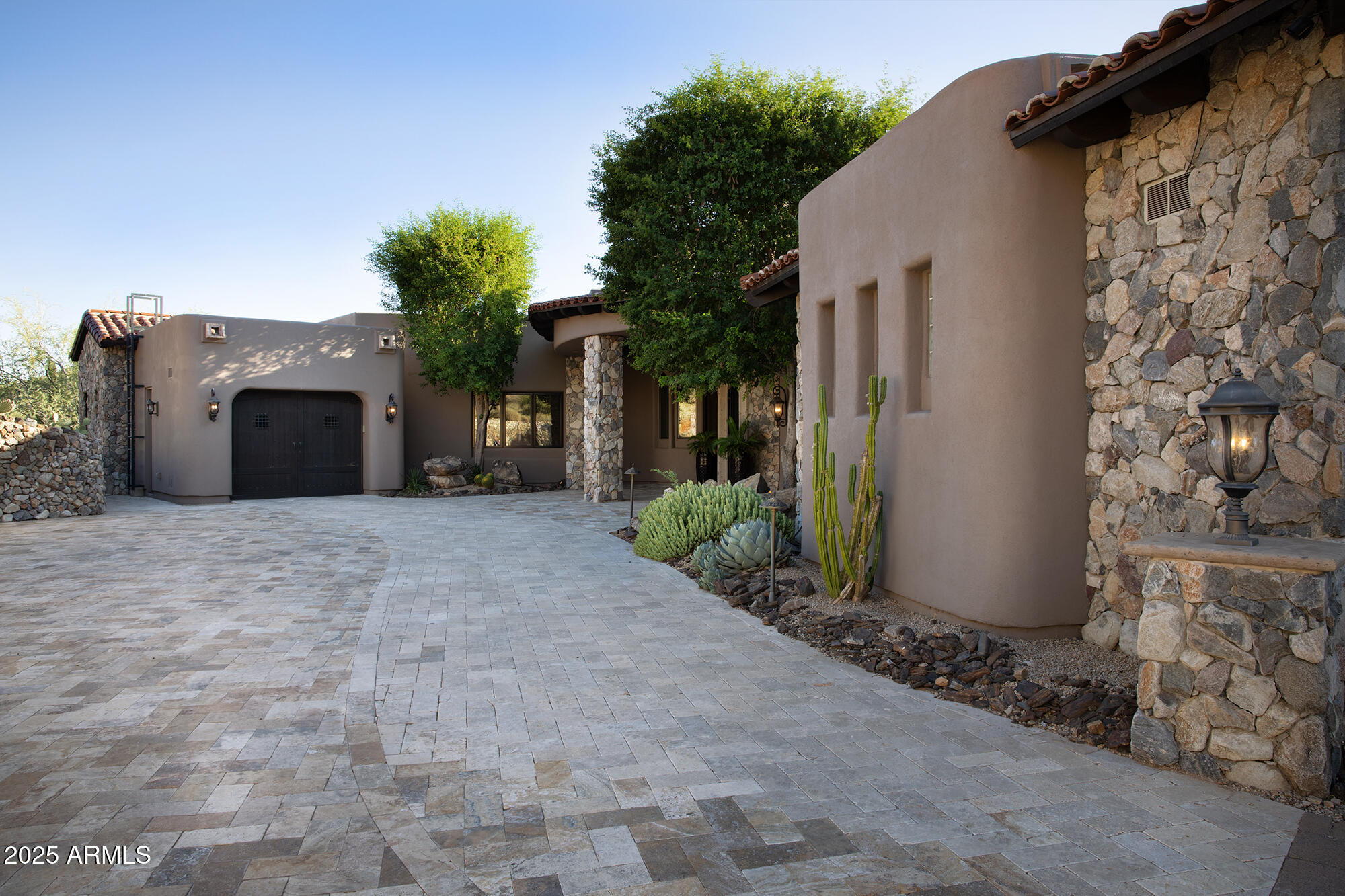 10801 East Happy Valley Road, Unit 119 Scottsdale, AZ 85255 - Photo 47 of 52 a view of a house with a yard and garage