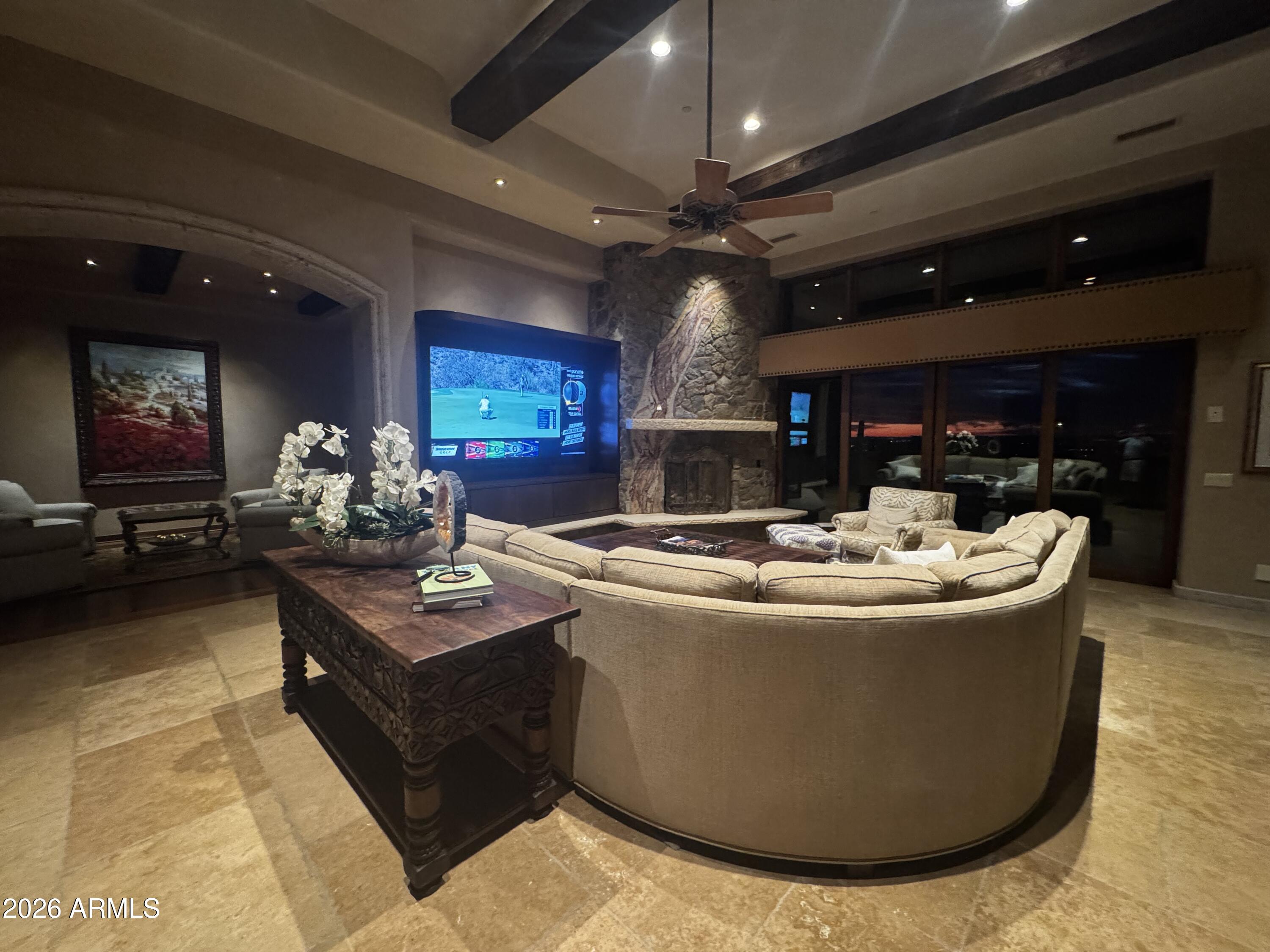 10801 East Happy Valley Road, Unit 119 Scottsdale, AZ 85255 - Photo 5 of 52 a view of living room with furniture and chandelier