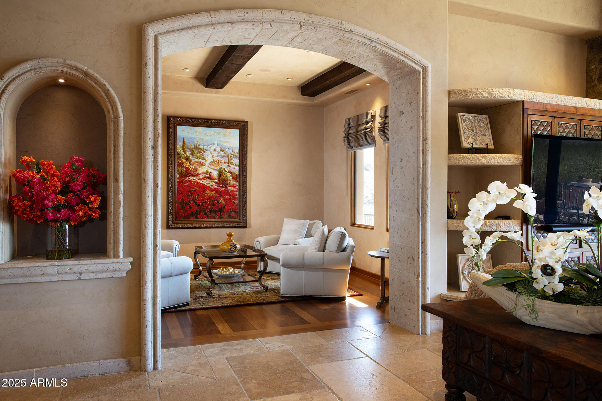 10801 East Happy Valley Road, Unit 119 Scottsdale, AZ 85255 - Photo 8 of 52 a living room with furniture and flowers