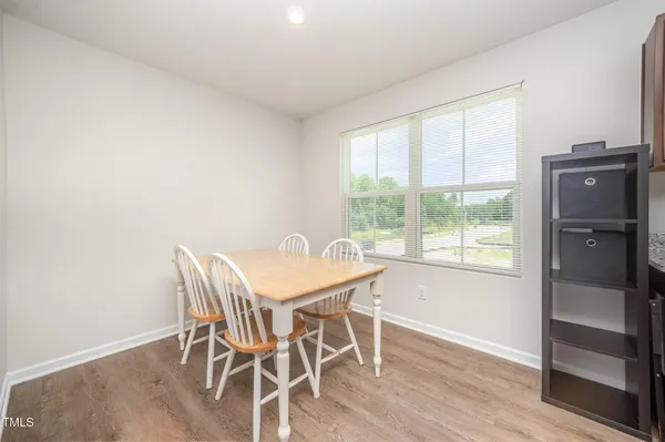 a kitchen with stainless steel appliances granite countertop a sink stove microwave and cabinets