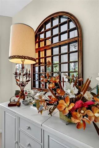 a kitchen with refrigerator and table
