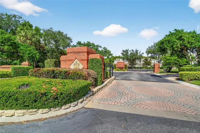 a view of a street with a building in the background