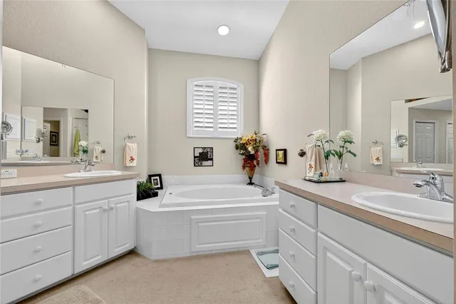 a kitchen with stainless steel appliances a cabinets and a stove top oven