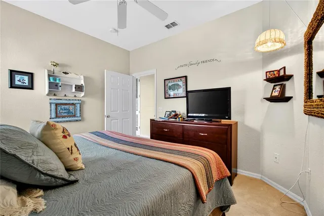 a view of garden with trees in the background